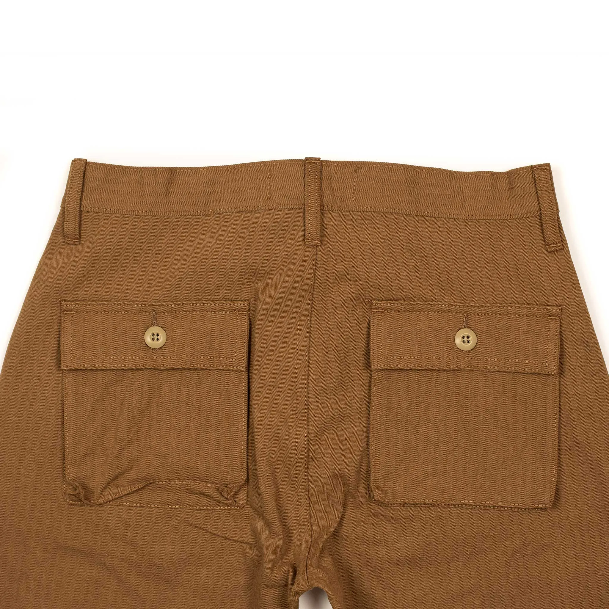 Fatigue pants in rust washed cotton herringbone twill