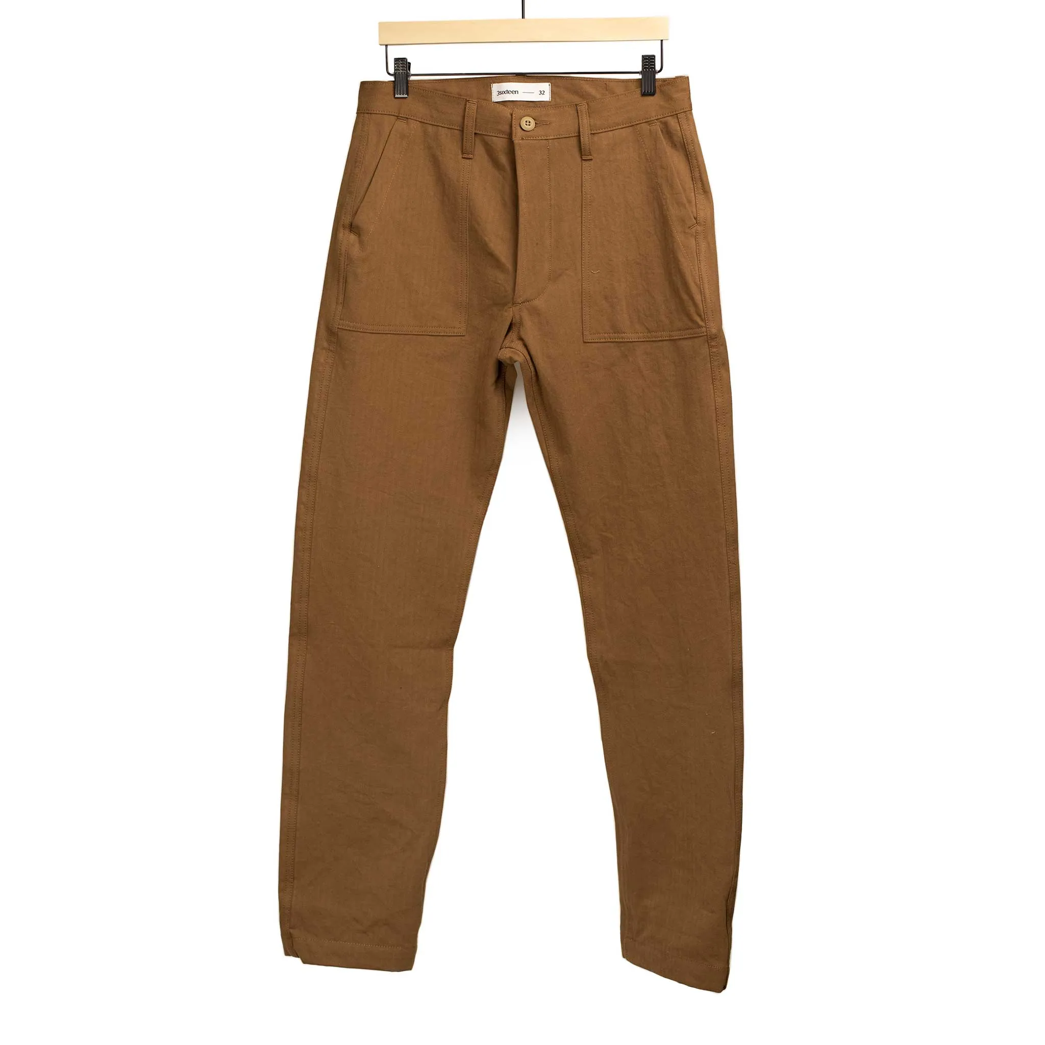 Fatigue pants in rust washed cotton herringbone twill